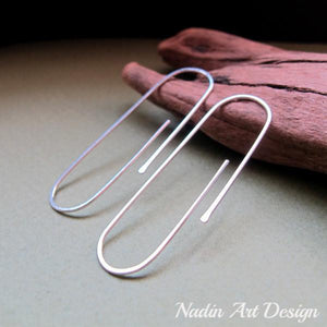 Long oval silver earrings